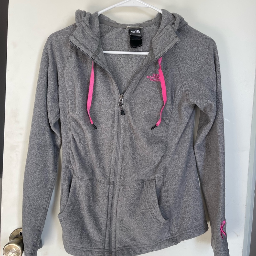 Grey north face zip up. Breast cancer one